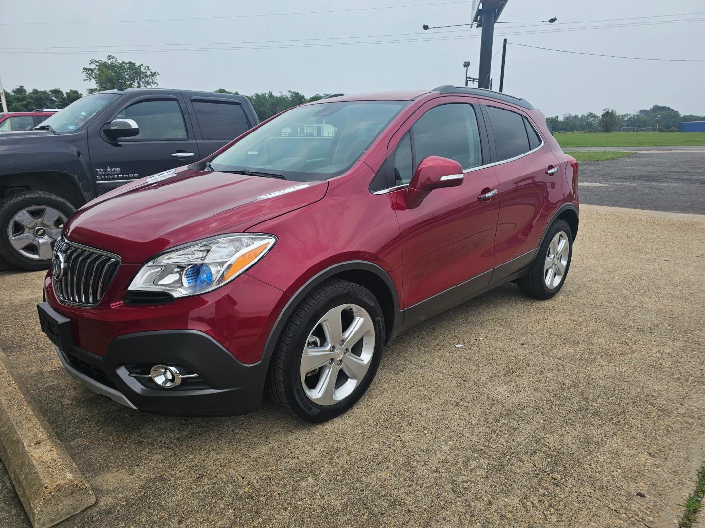 2015 MAROON Buick Encore Convenience FWD (KL4CJBSBXFB) with an 1.4L L4 DOHC 16V TURBO engine, 6-Speed Automatic transmission, located at 533 S Seven Points BLVD, Seven Points, TX, 75143, (430) 255-4030, 32.313999, -96.209351 - Photo#0